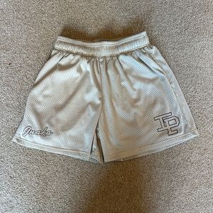 Inaka Power Cream shorts size medium